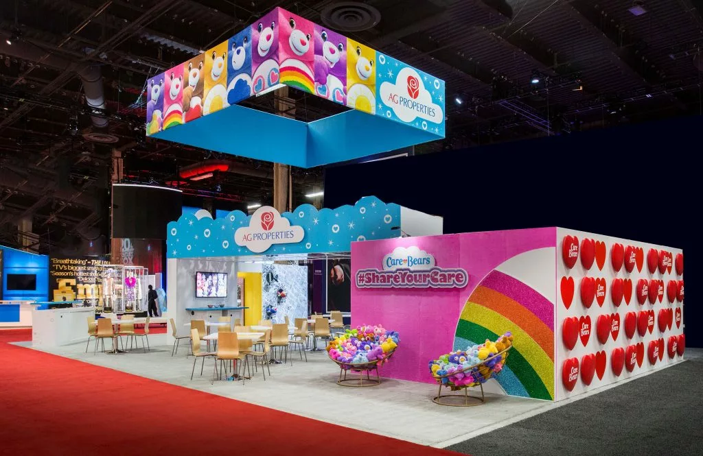 Care Bears trade show booth with photography backdrop wall.
