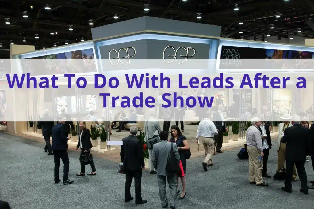 Text "What to do with leads after a trade show" with a group of people at a trade show exhibit in the background.