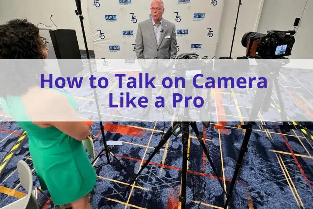 Text "How to talk on camera like a pro" with a photo of a man in a gray suit talking in front of two video cameras while a woman in a green dress watches.